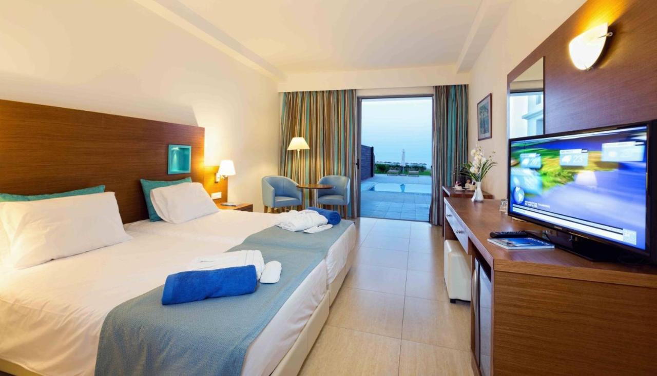 Asterias Beach Resort Afantou Bagian luar foto