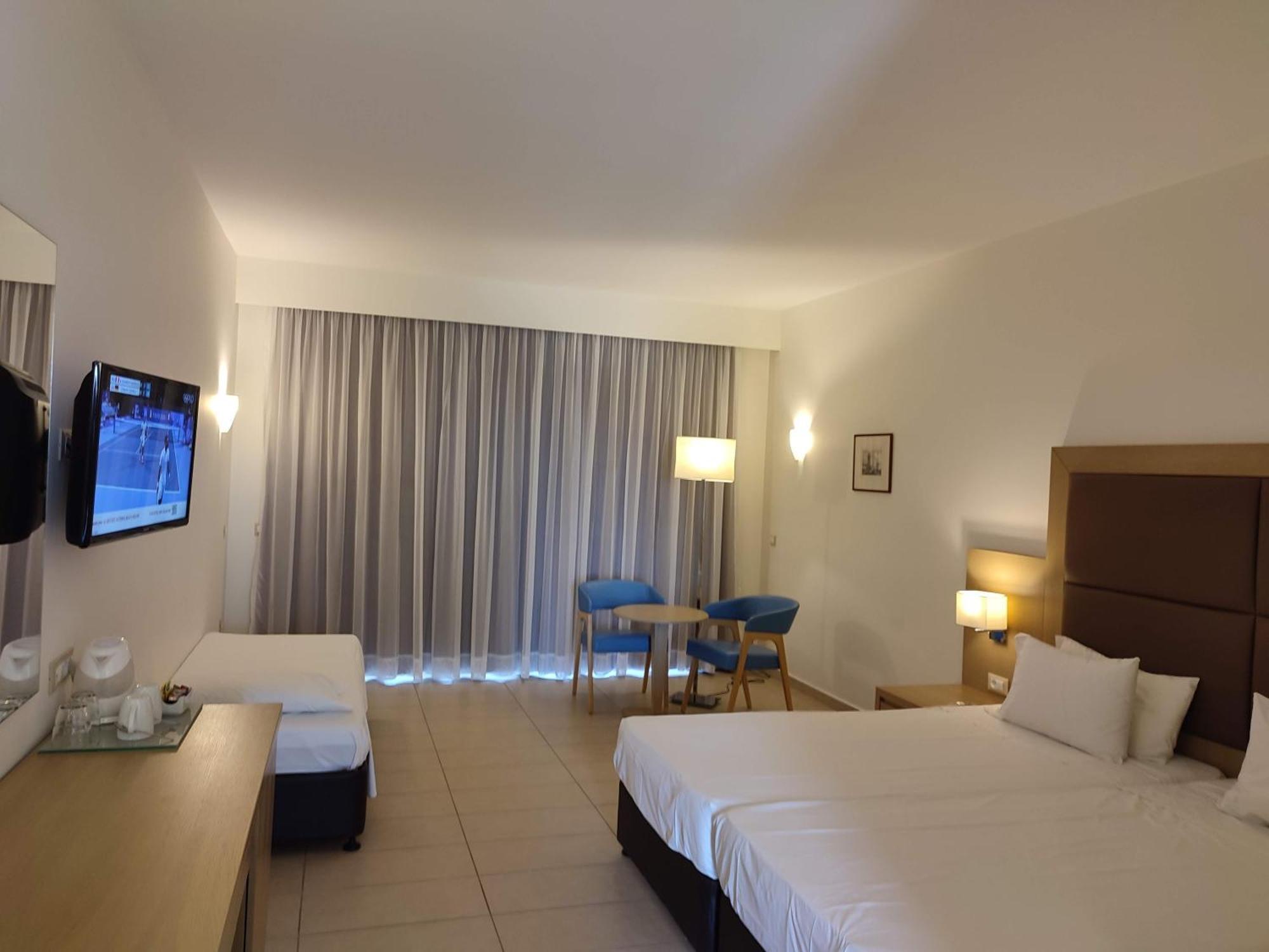 Asterias Beach Resort Afantou Bagian luar foto